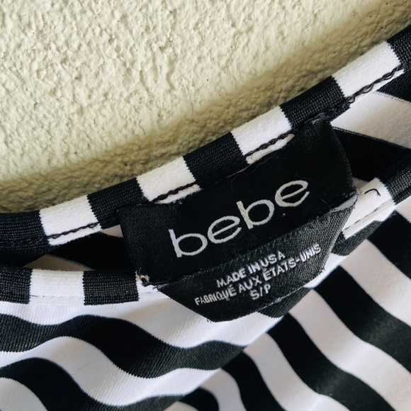 BEBE BLACK AND WHITE STRIPED PEPLUM MINI DRESS - Picture 6 of 6